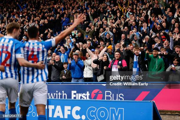 Matty Pearson of Huddersfield Town celebrates after scoring a goal to make it 1-0 during the Sky Bet Championship between Huddersfield Town and...