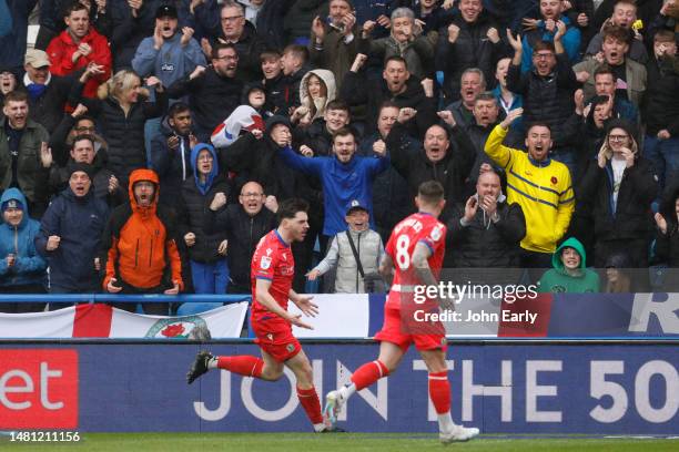 Joe Rankin-Costello of Blackburn Rovers celebrates with Sammie Szmodics in front of the travelling fans after scoring during the Sky Bet Championship...