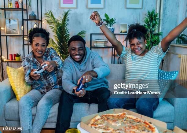 game night with friends - adrenaline junkie stock pictures, royalty-free photos & images