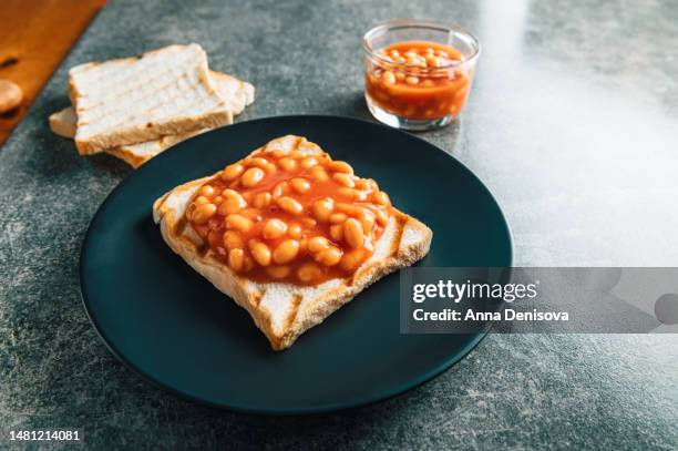 baked beans on toast - baked beans stock pictures, royalty-free photos & images