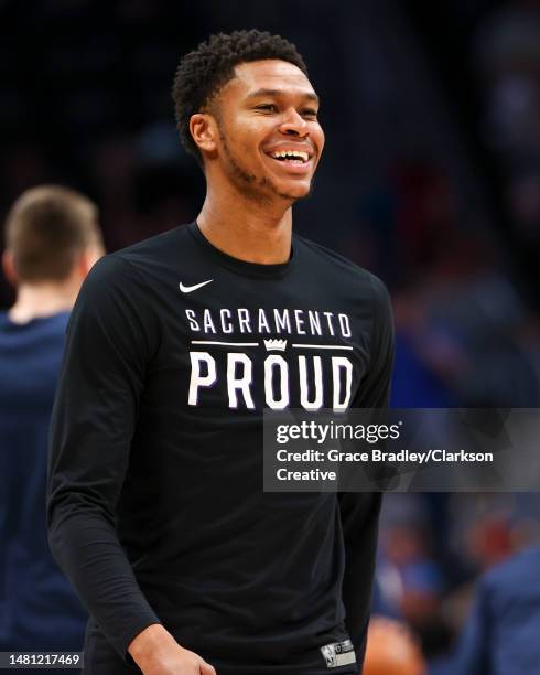 Dozier of the Sacramento Kings smiles during warm ups before the game against the Denver Nuggets at Ball Arena on April 9, 2023 in Denver, Colorado....