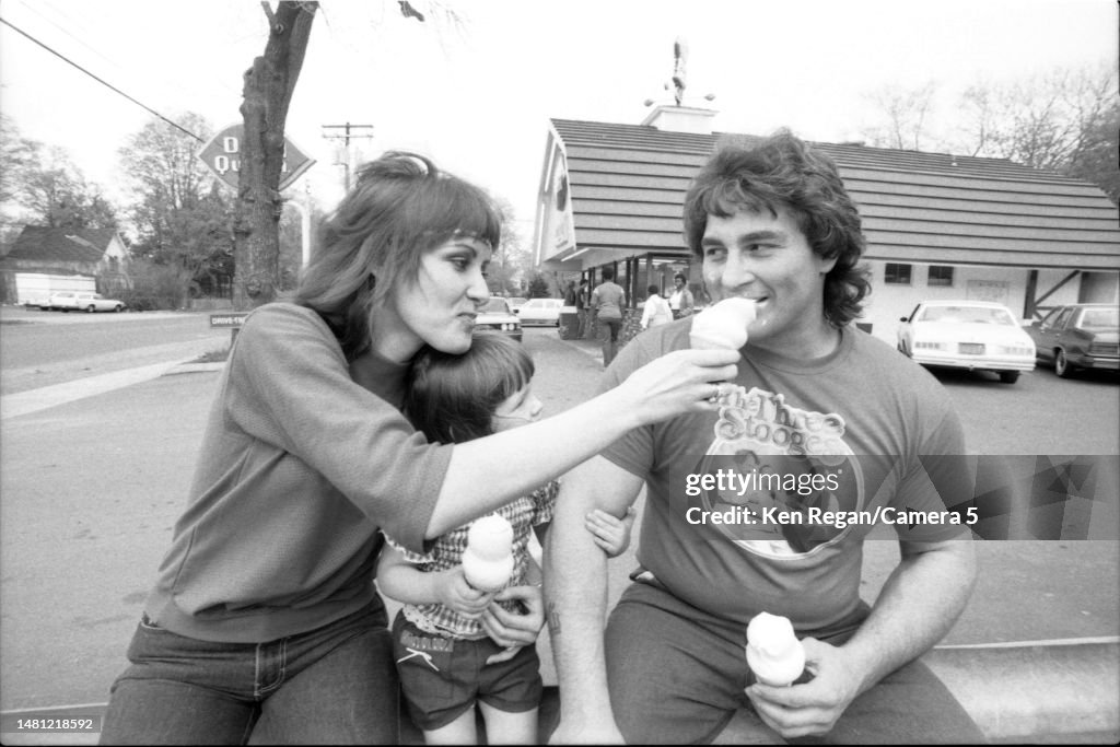 Wrestler Adrian Adonis is photographed with wife Bea and daughter