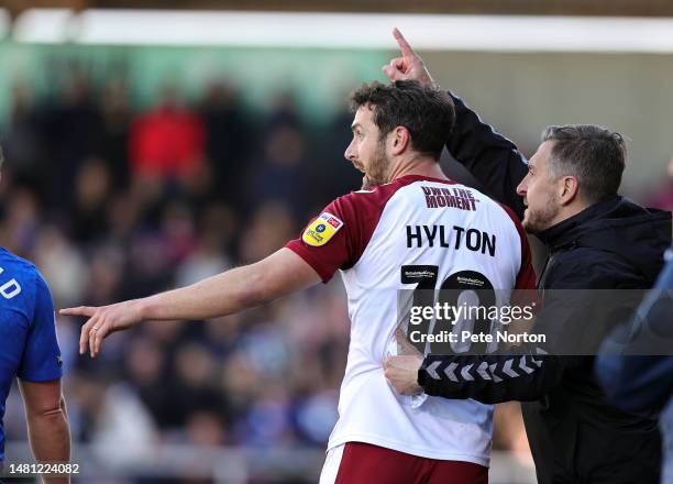 Northampton Town manager Jon Brady gives instructions to Danny Hylton during the Sky Bet League Two between Northampton Town and Gillingham at...