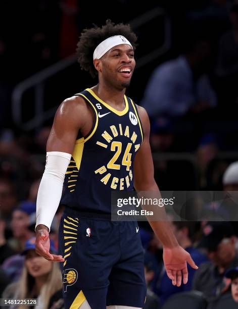 Buddy Hield of the Indiana Pacers reacts after he cut his hand in the second half against the New York Knicks at Madison Square Garden on April 09,...