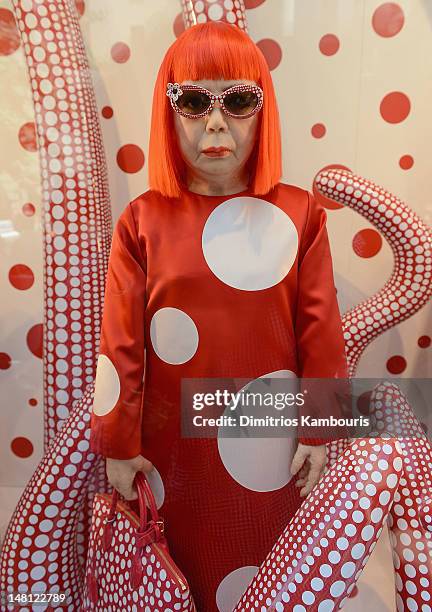 Wax figure of artist Yayoi Kusama on display during the Louis Vuitton And Yayoi Kusama Collaboration Unveiling at Louis Vuitton Maison on July 10,...
