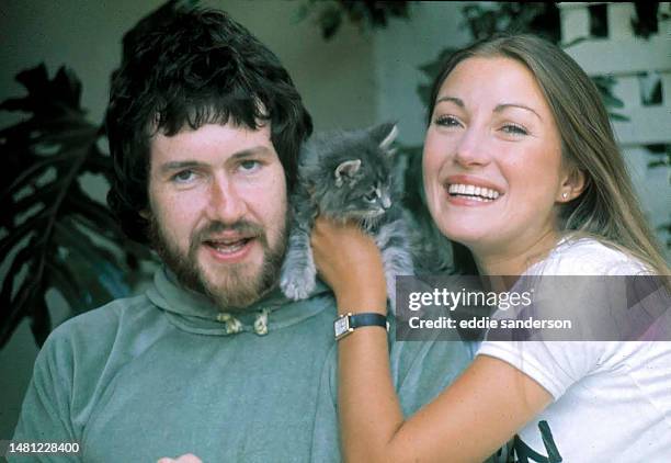 English actress Jane Seymour and second husband Geoffrey Planer pose for a portrait at their Hollywood Hills home in 1977 in Los Angeles, California.