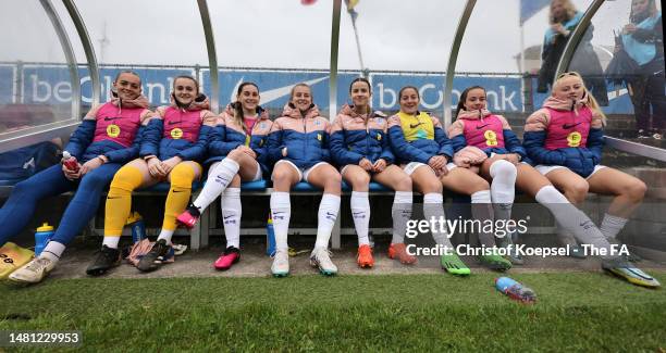 The substitute players of England sit on the bench during the Women's Under 23 International friendly match between Belgium and England at Cegeka...