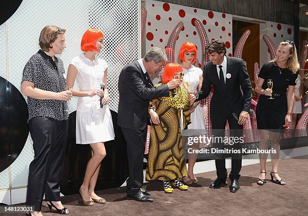 Louis Vuitton Chairman and CEO, Yves Carcelle and Yayoi Kusama attend the Louis Vuitton And Yayoi Kusama Collaboration Unveiling at Louis Vuitton...