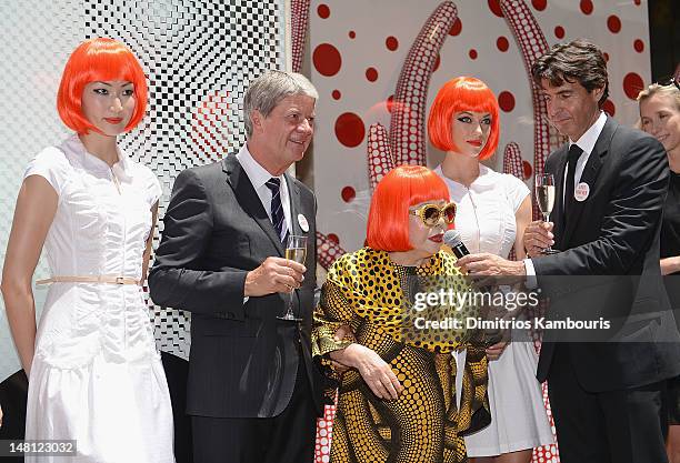 Louis Vuitton Chairman and CEO, Yves Carcelle and Yayoi Kusama attend the Louis Vuitton And Yayoi Kusama Collaboration Unveiling at Louis Vuitton...