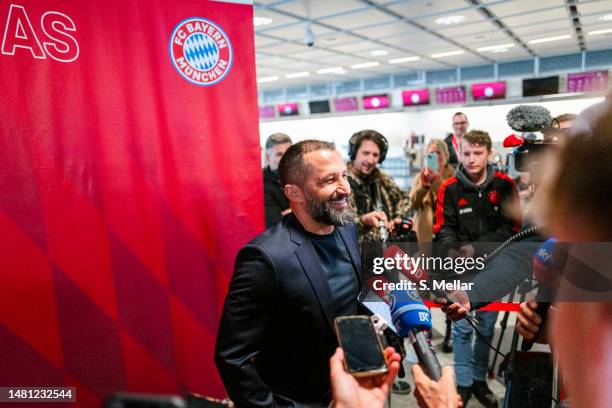 Sports director Hasan Salihamidzic of FC Bayern Muenchen answers questions from journalists at Munich Airport ahead of their UEFA Champions League...