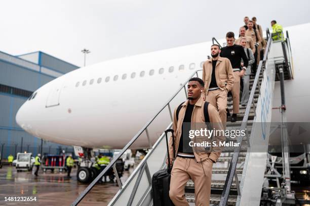 Ryan Gravenberch of FC Bayern Muenchen steps of the plane at Manchester airport ahead of their UEFA Champions League quarterfinal first leg match...