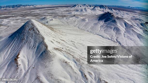 Aerial view of snowy mountain range, Warm Springs Nevada, Tonopah Highway 95, Great Basin Mountain Range.