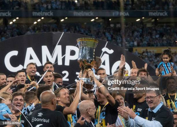 Lucas Leiva, Pedro Geromel and teammates celebrating after winning Caxias during Campeonato Gaucho Final match between Gremio and Caxias do Sul at...