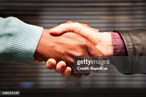 Black-white handshake Black-white handshake
