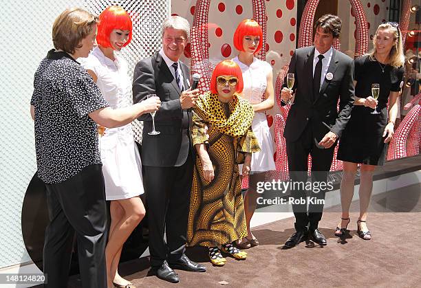 Japanese artist, Yayoi Kusama , with Louis Vuitton Chairman and CEO, Yves Carcelle and incoming CEO Jordi Constans attend the Louis Vuitton and Yayoi...