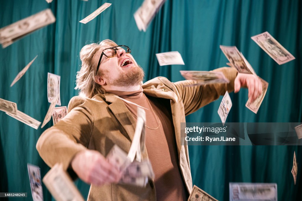 Retro Styled Man Celebrates in Falling Money
