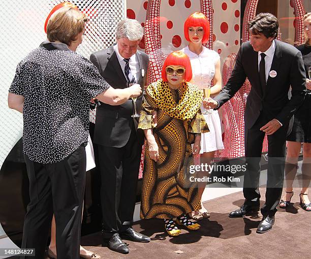 Japanese artist, Yayoi Kusama , with Louis Vuitton Chairman and CEO, Yves Carcelle and incoming CEO Jordi Constans attend the Louis Vuitton and Yayoi...