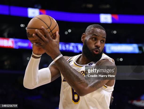 LeBron James of the Los Angeles Lakers grabs a rebound during a 128-117 Lakers win over the Utah Jazz at Crypto.com Arena on April 09, 2023 in Los...