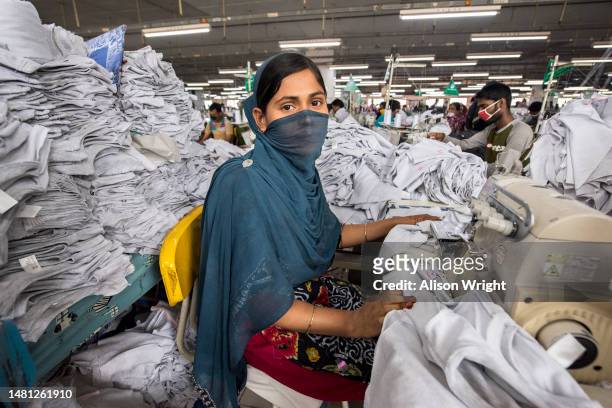 Female worker sews in a garment factory in Dhakha, Bangladesh on March 17, 2017.