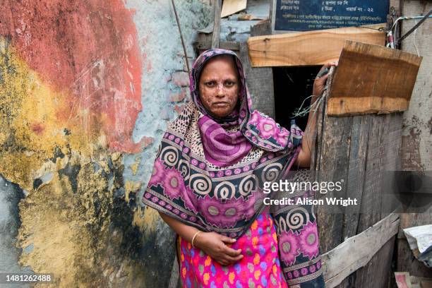 Portrait of a caretaker and cleaner for a public toilet in Khulna, Bangladesh on January 29, 2012.