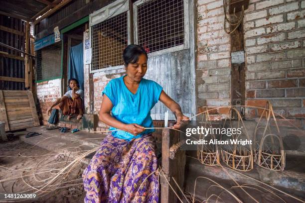 Basket weaver in Yangon, Myanmar on August 15, 2016.