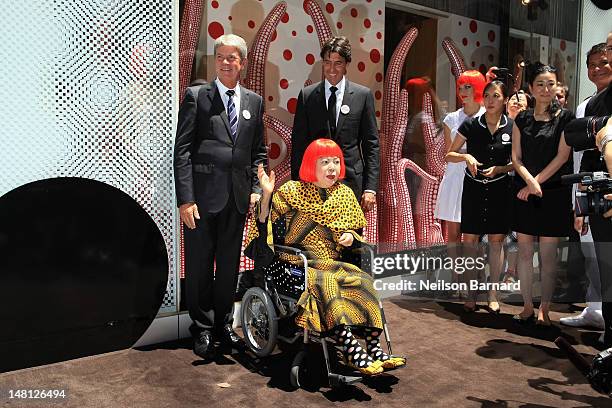 Present Louis Vuitton Chairman and CEO Yves Carcelle, artist Yayoi Kusama and future Louis Vuitton Chairman and CEO Jordi Constans attend the Louis...