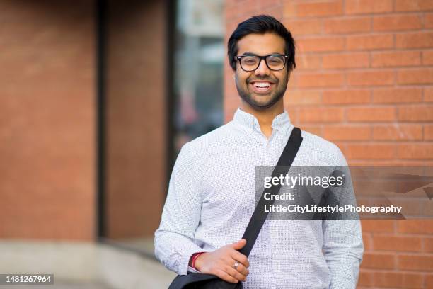 indian man commuting to work - foreign worker stock pictures, royalty-free photos & images