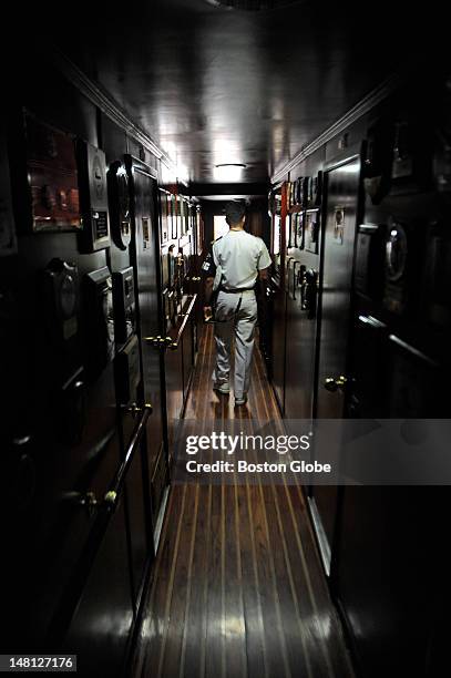 Cadet makes its way down a hall in the Buque Escuela Guayas from Ecuador, a training tall ship, while anchored at Pier 86 in N.Y. On May 28, 2012.