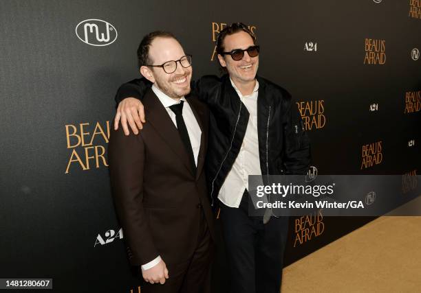 Ari Aster and Joaquin Phoenix attend the Los Angeles premiere of A24's "Beau Is Afraid" at the Directors Guild of America on April 10, 2023 in Los...