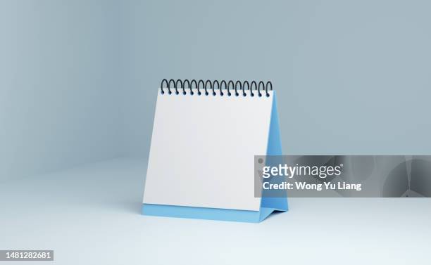 blank calendar with blue background ,3d render - calendar isolated stock pictures, royalty-free photos & images