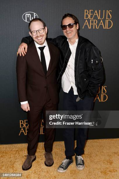 Ari Aster and Joaquin Phoenix attend the Los Angeles premiere of A24's "Beau Is Afraid" at the Directors Guild of America on April 10, 2023 in Los...