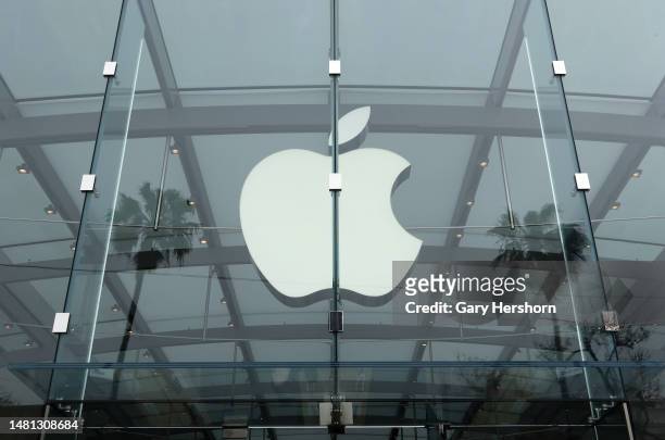 An Apple corporate logo hangs in the front of their store in Santa Monica on April 9 in Los Angeles, California.