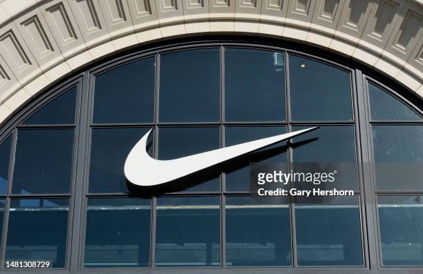 Nike corporate logo hangs on the front of their store at The Grove on April 9 in Los Angeles, California.