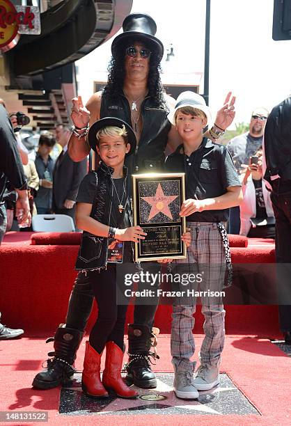 Musician Slash with his children London and Cash. Slash was honored with the 2,473rd Star on the Hollywood Walk of Fame outside the Hard Rock Cafe on...