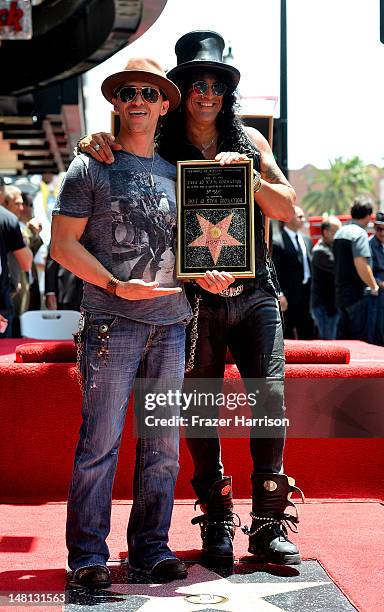 Actor Clifton Collins Jr with Slash who was honored with the 2,473rd star on the Hollywood Walk of Fame outside the Hard Rock Cafe on July 10, 2012...