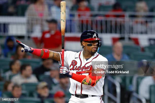 Ronald Acuna Jr. #13 of the Atlanta Braves calls for time during the seventh inning against the Cincinnati Reds at Truist Park on April 10, 2023 in...