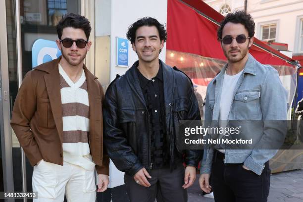 Nick Jonas, Joe Jonas and Kevin Jonas from the 'Jonas Brothers' arriving at Global Radio Studios to promote their new single 'Waffle House' on April...