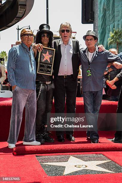 Producer Robert Evans, guitarist Slash, DJ Jim Ladd, Actor Charlie Sheen attend Slash's Hollywood Walk of Fame ceremony on July 10, 2012 in...