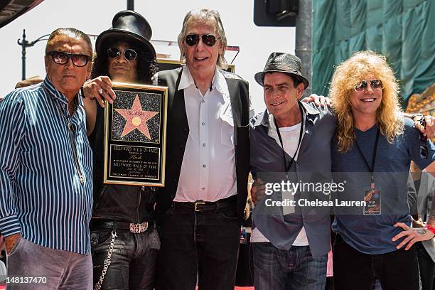 Producer Robert Evans, guitarist Slash, DJ Jim Ladd, actor Charlie Sheen and drummer Steven Adler attend Slash's Hollywood Walk of Fame ceremony on...