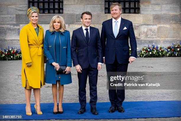 King Willem-Alexander of The Netherlands and Queen Maxima of the Netherlands welcome French President Emmanuel Macron and his wife Brigitte Macron...