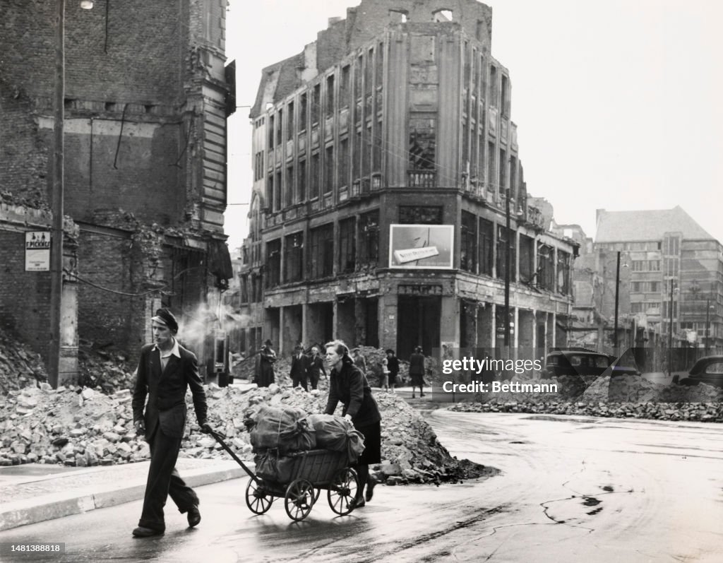 Couple Transporting Potatoes In Berlin