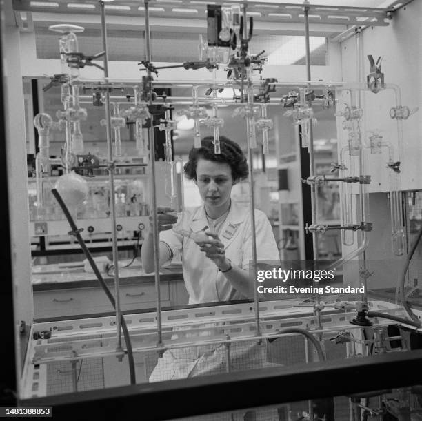 Scientist working in the laboratory of the Radiochemical Centre Limited at Amersham, Buckinghamshire, April 5th, 1960.