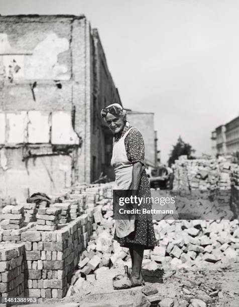 Woman named as Ilse Krause, aged 70, is helping to rebuild the Technical University in Berlin which suffered extensive damage in the war, August 5th...