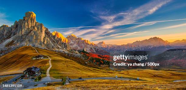 scenic view of mountains against sky during sunset,passo di giau,colle santa lucia,belluno,italy - colle santa lucia stock pictures, royalty-free photos & images