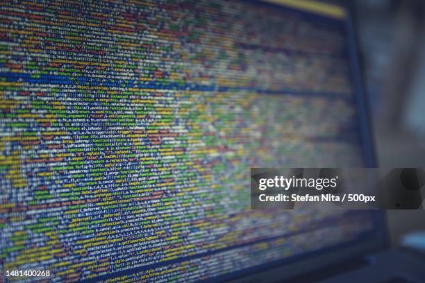 long colorful lines of code on a computer screen,romania - html - fotografias e filmes do acervo