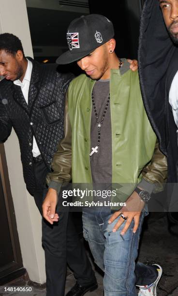 Lewis Hamilton leaving Funky Buddha Club on July 10, 2012 in London, England.