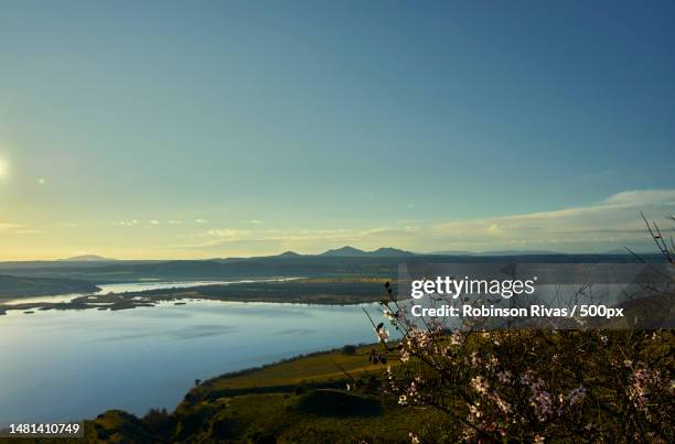 scenic view of sea against sky during sunset,toledo,spain - castilla la mancha stock-fotos und bilder