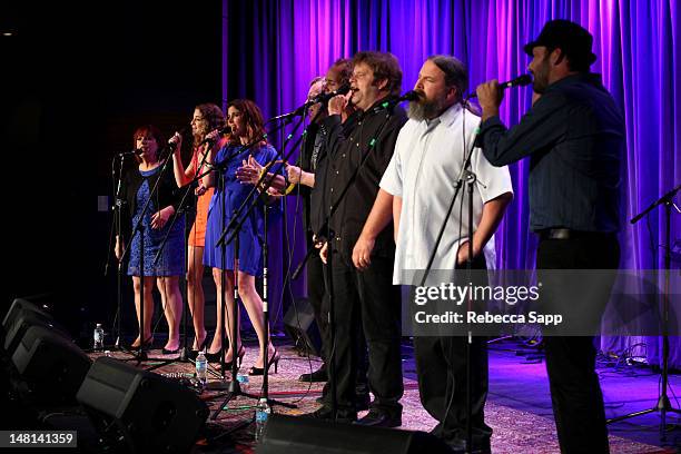 Carnie Wilson, Ambha Love, Wendy Wilson, Matt Jardine, Christian Love, Adam Jardine, Justyn Wilson and Carl Wilson of California Saga perform onstage...