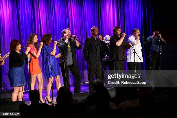 Carnie Wilson, Ambha Love, Wendy Wilson, Matt Jardine, Christian Love, Adam Jardine, Justyn Wilson and Carl Wilson of California Saga perform onstage...