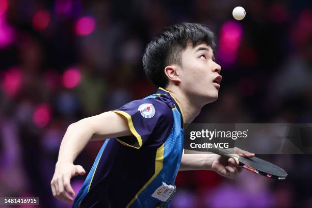 Lin Yun-Ju of Chinese Taipei serves against Ma Long of China in their Men's Singles Round of 16 match on day three of WTT Champions Xinxiang 2023 at...